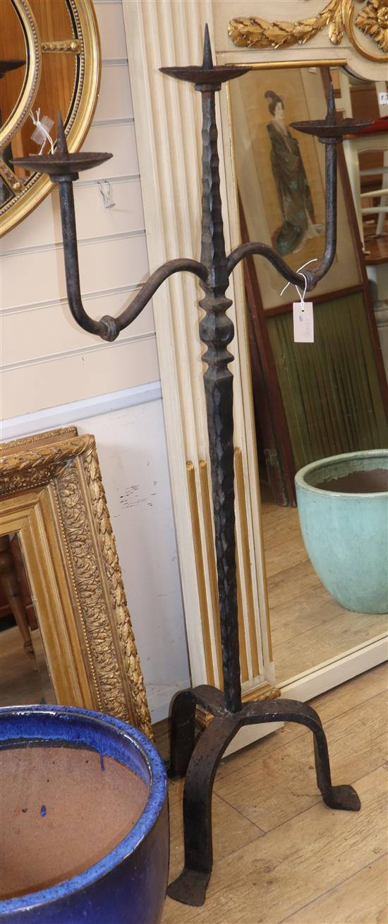 A wrought iron pricket standing candlestick H.148cm